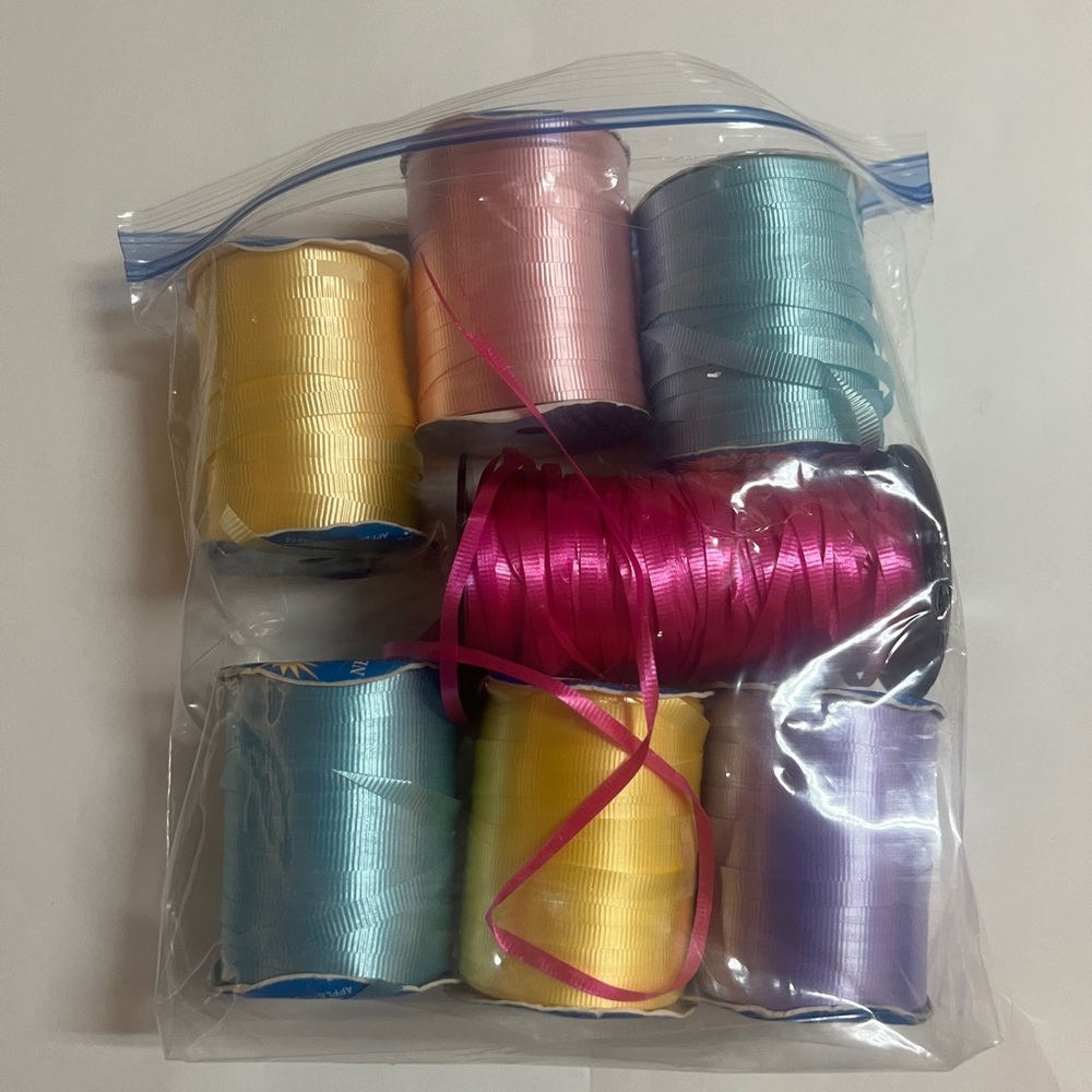 Set Of Multicolored Ribbon. The paper company 1/4 poly curling ribbon. Used
